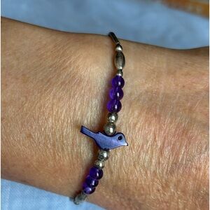 Child's small beaded bird bracelet